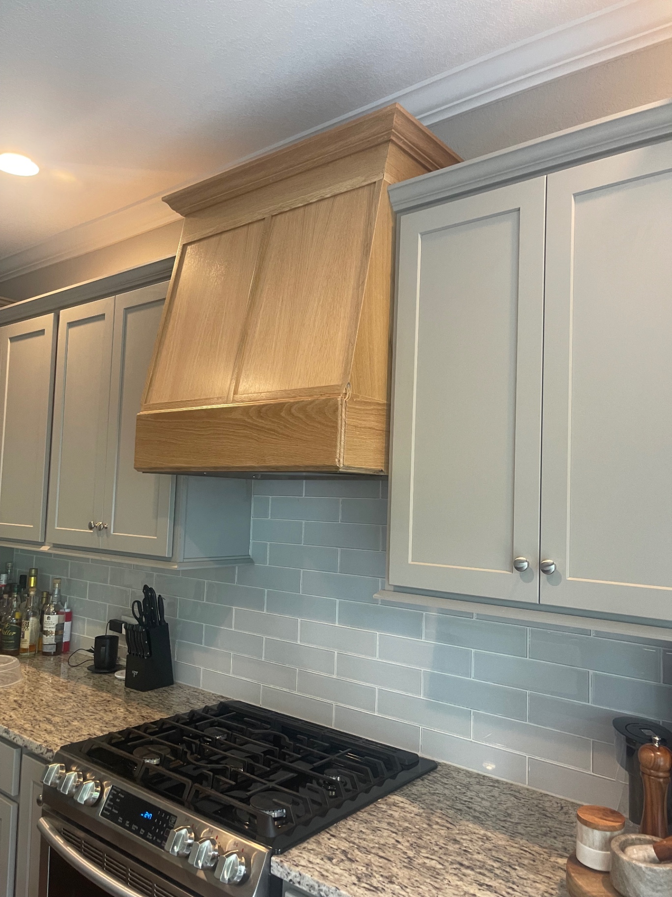 Custom Range Hood & Painted Cabinetry